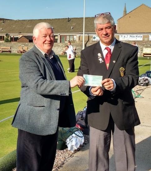 Photograph of St Fergus Bowling Club Donates £300 to Laurandy Day Care Centre